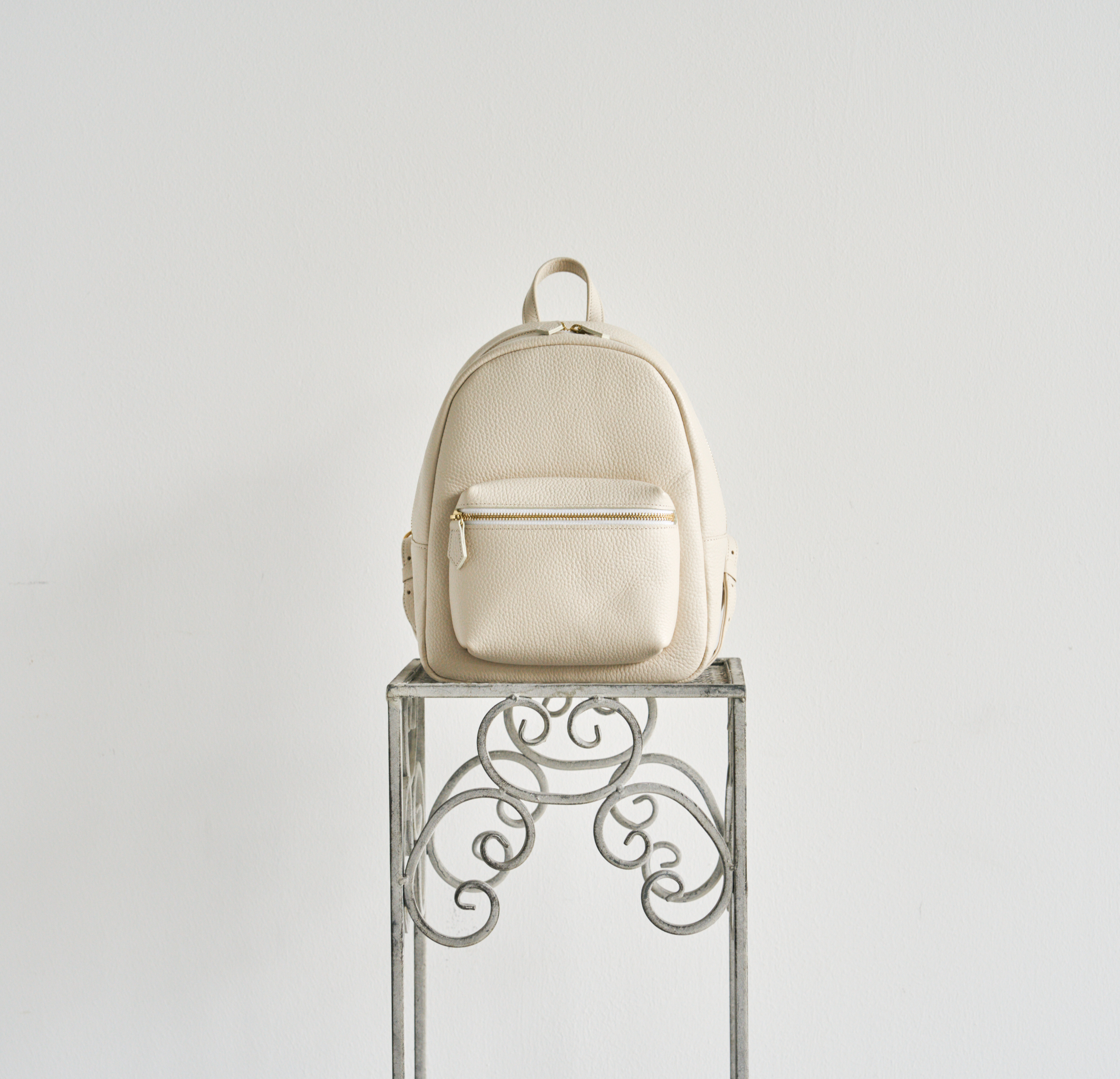 Leather mini backpack in pink beige