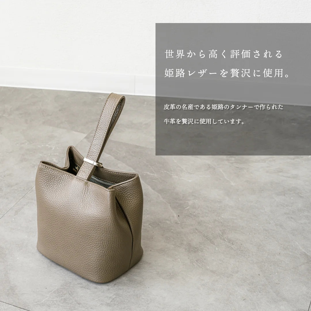 ［新古品］巾着レザーバッグ トープ